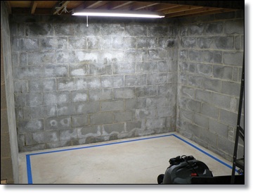 2 coat application of Hydro-Seal 75 to floors and walls plus patching of snap tie holes and hairline cracks in floor
