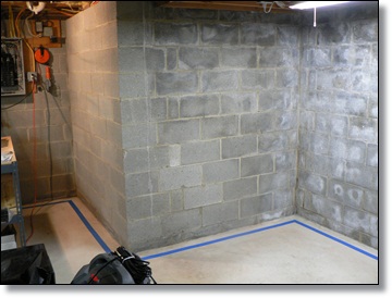 2 coat application of Hydro-Seal 75 to floors and walls plus patching of snap tie holes and hairline cracks in floor